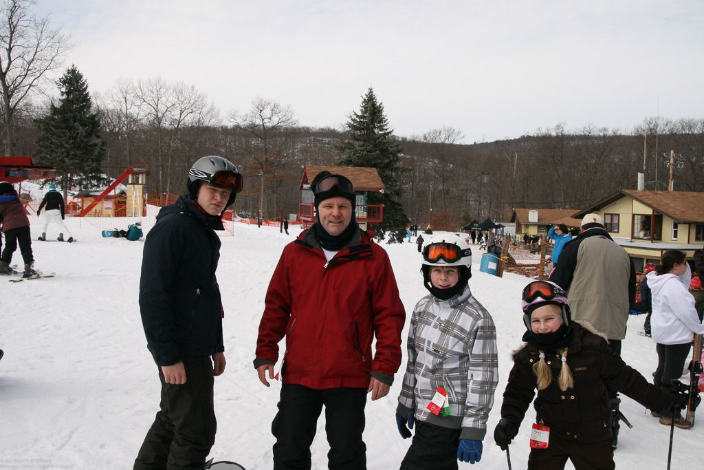 Dad got in one!    ~~  Dan, Dad, Quinn, Mary. Tuxedo Ridge/Sterling Mtn Ski vaca. 2011