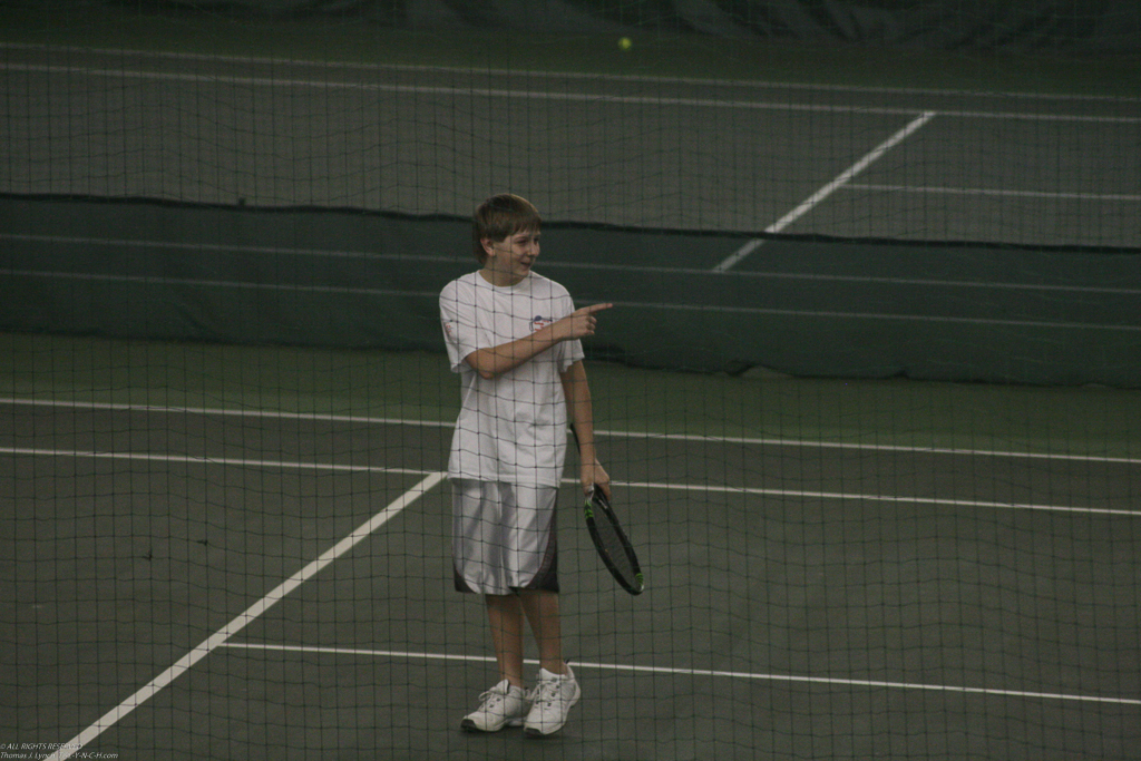 Quinn at Tennis match  ~~  he has gotten very good with his new racquet 
