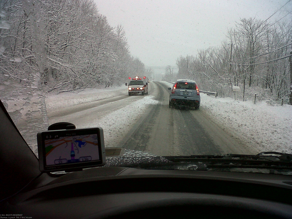 A lot of accidents, tow trucks, ambulance, and cars off the road!  ~~  
