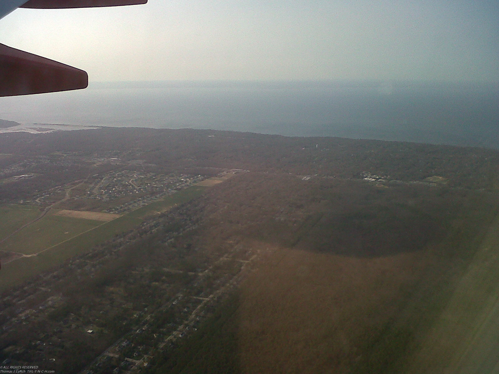 Look boss the house?  there it is?  Mt. Sinai harbor to the left.  ~~  flying back from Sales Kick off.   Ben a few yars since i took shots from a plane.....
