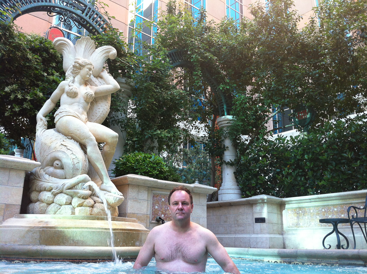 With another woman at the Venetian, near Bouchon restaurant   ~~  Kinda stiff personality and she took my company for granite.  Rock hard abs!!!!