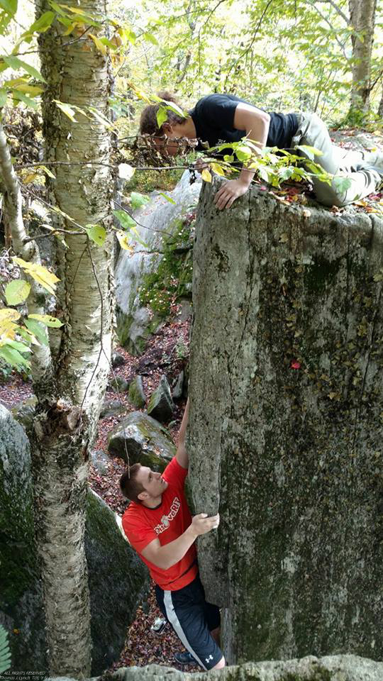 Daniel climbing cliff  ~~  Stolen from Facebook from one of his friends its the only way we know what he is up to??