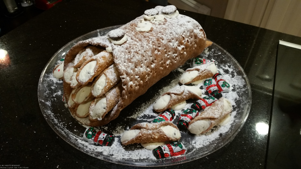 The mother of all canoli  ~~  At the Tarsi home for Chrstmas a la Italiano dinner of the 7 NO make that 11 fishes!!!!!