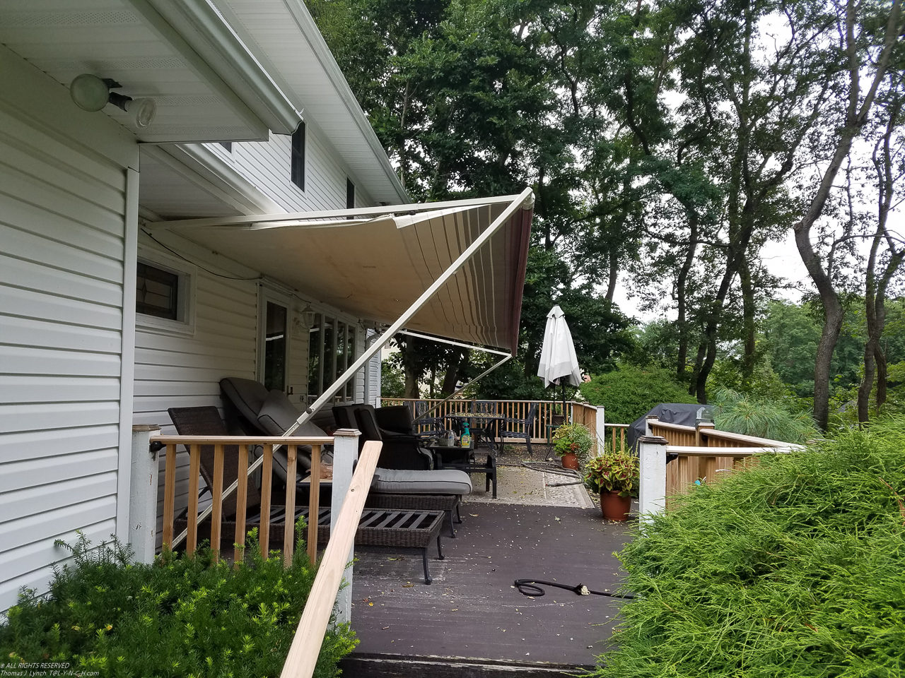 July Project 2017  ~~  30 yr old sunsetter awning from previous owner.  I broke 3 fingers trying to repair this thing after Sandy fill it with a few hundred gallons of water.  Bent the Roller.