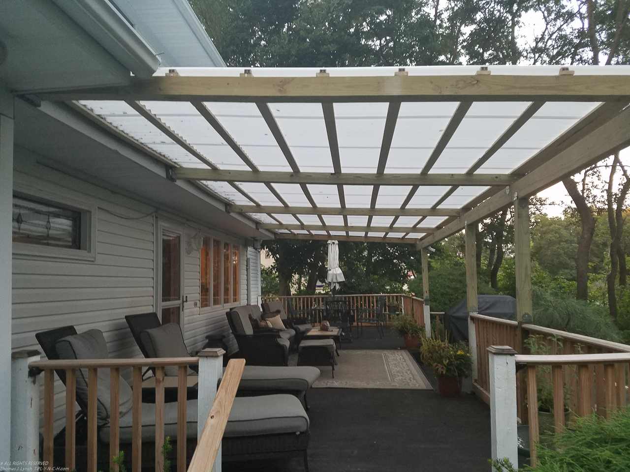 July Project 2017  ~~  New Japanese look pergola.  6.15% grade on a 5% min.  Hope the snow slides off????