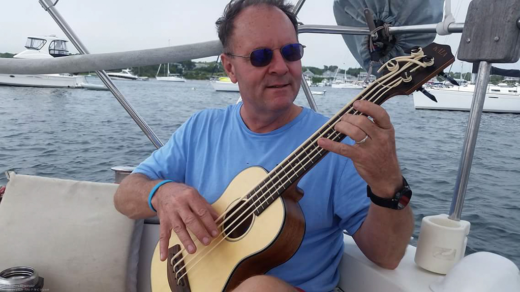 Playing a Ubass on Raggamuffin in the Great Salt Pond on mooring  ~~  My Long Cruise Bucket List item Block Island Sailing Adventure